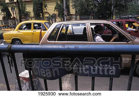 Stock Image - Clean Calcutta Sign On Railings. Fotosearch