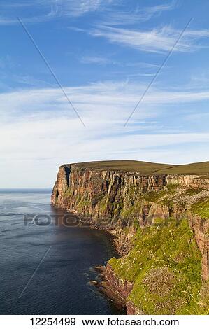 Cliff along the coastline; Orkney, Scotland View Large Photo Image Stock Photo - Cliff along the coastline; Orkney, Scotland. Fotosearch