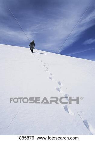 Climber Walking Up Snowy Slope In The Sierra Nevada Mountains View Large Photo Image Stock Photograph - Climber Walking Up Snowy Slope In The Sierra Nevada Mountains. Fotosearch