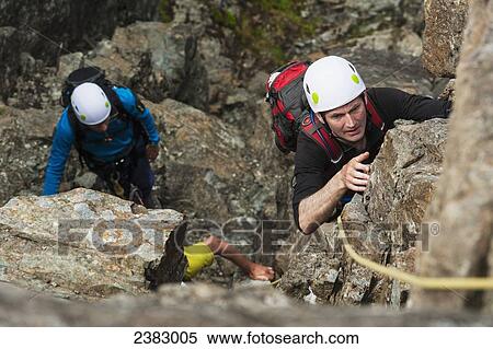 Climbers ascending Am Basteir in the Black Cuillin; Isle of Skye, Scotland View Large Photo Image Stock Photography - Climbers ascending Am Basteir in the Black Cuillin; Isle of Skye, Scotland. Fotosearch
