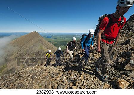 Climbers going up ridge in the Black Cuillin; Isle of Skye, Scotland View Large Photo Image Stock Photo - Climbers going up ridge in the Black Cuillin; Isle of Skye, Scotland. Fotosearch