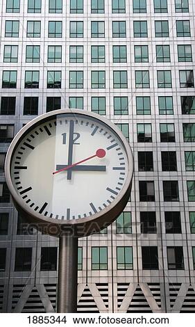 Picture - Clock And Canary Wharf Building, Close Up. Fotosearch