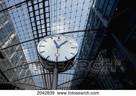 Stock Photo - Clock In The Berlin Railway Station, Germany. Fotosearch