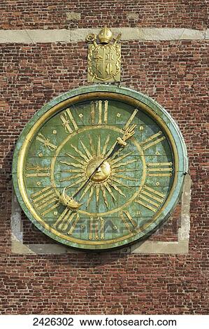 Stock Image - Clock on clock tower of Krakow Cathedral, Wawel Hill; Krakow, Poland. Fotosearch