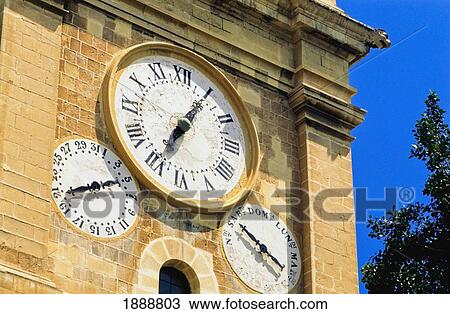 Stock Image - Clocks On St John's Cathedral. Fotosearch