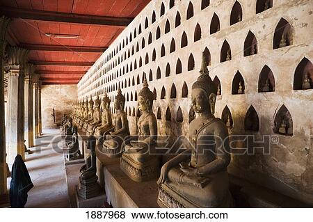 Cloister Containing Over 2000 Silver And Ceramic Buddhas In Small Niches. View Large Photo Image Stock Photo - Cloister Containing Over 2000 Silver And Ceramic Buddhas In Small Niches.. Fotosearch