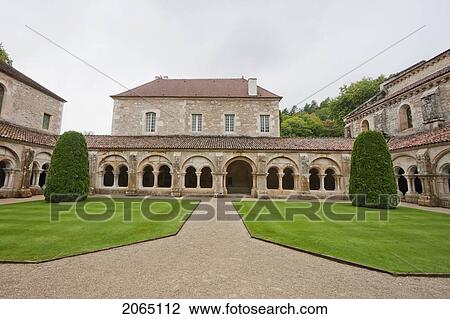 Stock Image - Cloister Garden Of The Cistercian Abbey Of Fontenay, Cote D'or, France. Fotosearch