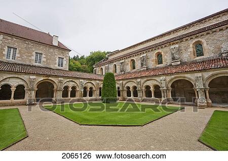 Stock Photograph - Cloister Garden Of The Cistercian Abbey Of Fontenay, Cote D'or, France. Fotosearch
