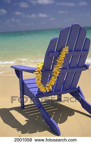 Close-Up Blue Beach Chair With Plumeria Hanging On Side Facing Ocean View Large Photo Image Stock Photo - Close-Up Blue Beach Chair With Plumeria Hanging On Side Facing Ocean. Fotosearch