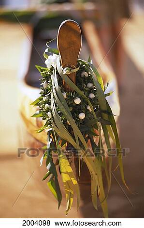 Close-Up Detail Koa Outrigger Canoe With Ti-Leaf Lei Tied To Bow, Afternoon Light View Large Photo Image Stock Photo - Close-Up Detail Koa Outrigger Canoe With Ti-Leaf Lei Tied To Bow, Afternoon Light. Fotosearch