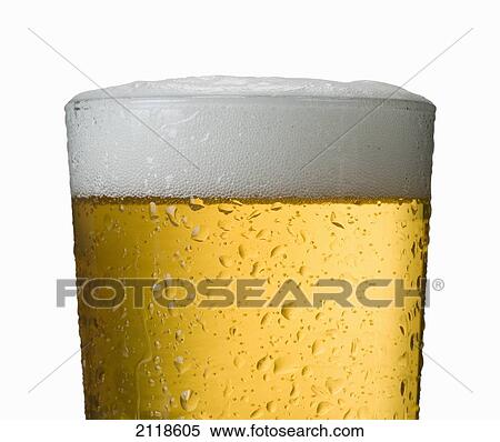 Stock Photography - Close-Up Detail Of Beer In Wet Glass. Fotosearch