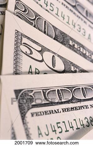 Stock Photo - Close-Up Detail Of Upper Left Hand Corner Of New Currency, 100, 50 And 20 Dollar Bill. Fotosearch