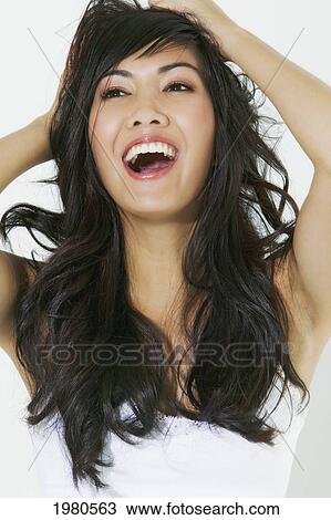 Close-Up Of A Beautiful Asian Woman. View Large Photo Image Stock Image - Close-Up Of A Beautiful Asian Woman.. Fotosearch