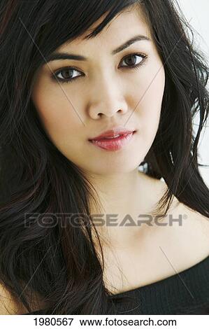 Stock Photo - Close-Up Of A Beautiful Asian Woman.. Fotosearch