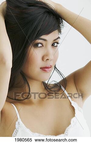 Stock Photography - Close-Up Of A Beautiful Asian Woman.. Fotosearch