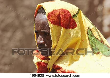 Stock Photo - Close-up of a Dogon woman wrapped in blanket Neni, Mali. Fotosearch