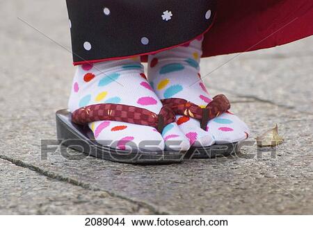 Close Up Of A Japanese Woman's Feet Wearing White Socks With Colored Dots And Sandals; Kyoto, Japan View Large Photo Image Picture - Close Up Of A Japanese Woman's Feet Wearing White Socks With Colored Dots And Sandals; Kyoto, Japan. Fotosearch