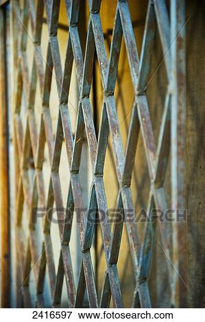 Stock Photo - Close up of a worn metal grate; Beirut, Lebanon. Fotosearch