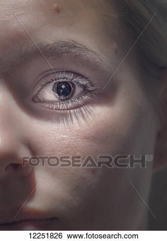 Close up of a young woman's eye and face; Torremolinos, Malaga, Andalusia, Spain View Large Photo Image Stock Photograph - Close up of a young woman's eye and face; Torremolinos, Malaga, Andalusia, Spain. Fotosearch