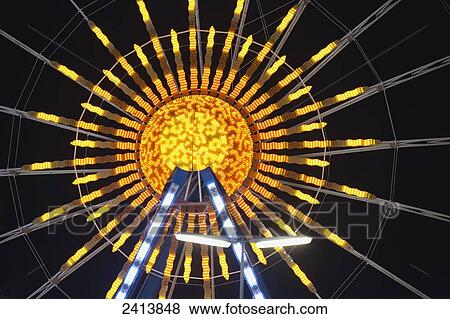 Close up of amusement park ferris wheel ride at night with lights; Munich, Germany View Large Photo Image Stock Photo - Close up of amusement park ferris wheel ride at night with lights; Munich, Germany. Fotosearch