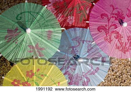 Close-Up Of Cocktail Umbrella's In The Sand Viewed From Above View Large Photo Image Stock Image - Close-Up Of Cocktail Umbrella's In The Sand Viewed From Above. Fotosearch