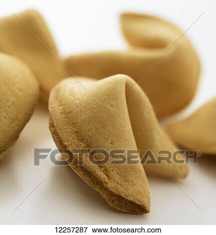 Close up of fortune cookies on white background View Large Photo Image Stock Photo - Close up of fortune cookies on white background. Fotosearch