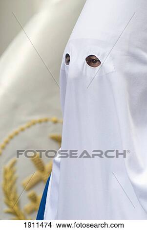 Close Up Of Man Wearing Hooded Mask At Semana Santa Easter Festival, Cadiz, Andalucia, Spain View Large Photo Image Picture - Close Up Of Man Wearing Hooded Mask At Semana Santa Easter Festival, Cadiz, Andalucia, Spain. Fotosearch