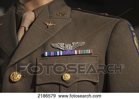 Close-Up Of Military Uniform, Silent Wings Museum, A Public Institution, Lubbock, Texas, Usa View Large Photo Image Stock Photo - Close-Up Of Military Uniform, Silent Wings Museum, A Public Institution, Lubbock, Texas, Usa. Fotosearch