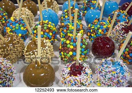 Close-up of multi-coloured candy apples; Calgary, Alberta, Canada View Large Photo Image Stock Image - Close-up of multi-coloured candy apples; Calgary, Alberta, Canada. Fotosearch