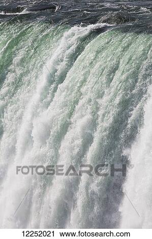 Stock Image - Close up of Niagara Falls, Horseshoe Falls; Niagara Falls, Ontario, Canada. Fotosearch