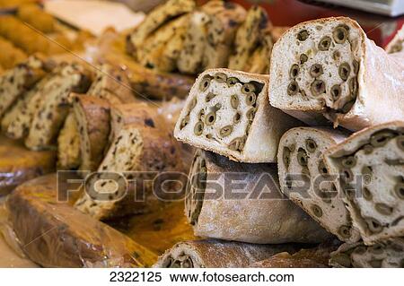 Close up of olive bread in bakery; Ferrara, Emilia-Romagna, Italy View Large Photo Image Stock Photography - Close up of olive bread in bakery; Ferrara, Emilia-Romagna, Italy. Fotosearch