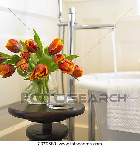 Close-Up Of Orange Tulips In A Vase In Front Of Bathtub Faucet With Running Water. Victoria Bc View Large Photo Image Stock Image - Close-Up Of Orange Tulips In A Vase In Front Of Bathtub Faucet With Running Water. Victoria Bc. Fotosearch