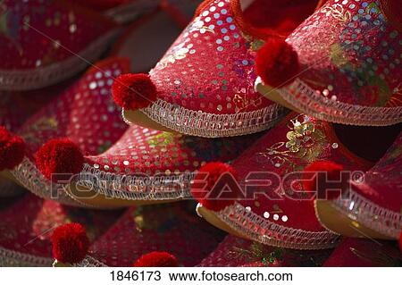 Stock Image - Close-Up Of Red Slippers At Market; Istanbul, Turkey. Fotosearch