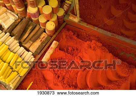 Close-up of red tika powder and other offerings used to worship Shiva, stall in bazaar, holy city of Omkareshwar, Madhya Pradesh, India, Omkareshwar, Madhya Pradesh, India. View Large Photo Image Stock Image - Close-up of red tika powder and other offerings used to worship Shiva, stall in bazaar, holy city of Omkareshwar, Madhya Pradesh, India, Omkareshwar, Madhya Pradesh, India.. Fotosearch