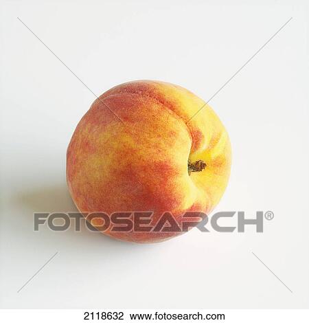 Stock Image - Close-Up Of Ripe Peach On White Background. Fotosearch