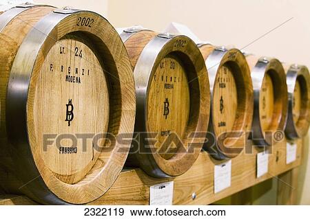Stock Photo - Close up of small oak barrels; Spilamberto, Emilia-Romagna, Italy. Fotosearch
