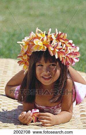 Close-Up Of Smiling Girl Laying On Lauhala Mat, Plumeria Haku On Head View Large Photo Image Stock Photo - Close-Up Of Smiling Girl Laying On Lauhala Mat, Plumeria Haku On Head. Fotosearch