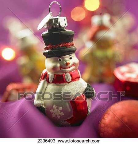 Close-Up Of Snowman Christmas Ornament On Purple Background View Large Photo Image Stock Image - Close-Up Of Snowman Christmas Ornament On Purple Background. Fotosearch