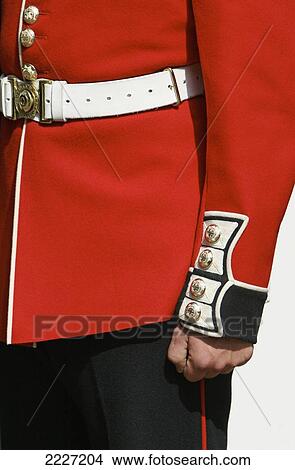Close Up Of Soldiers Uniform From The Queens Household Division Guarding Buckingham Palace, London, England, Uk, Europe View Large Photo Image Picture - Close Up Of Soldiers Uniform From The Queens Household Division Guarding Buckingham Palace, London, England, Uk, Europe. Fotosearch
