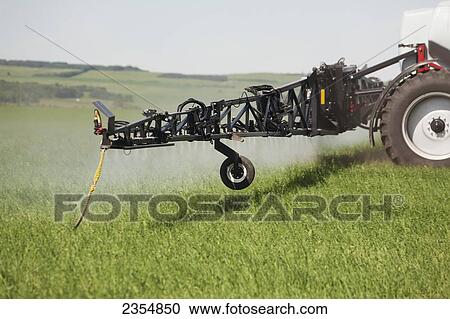 Close Up Of Sprayer, Spraying In A Young Green Barley Field; Sylvan Lake, Alberta, Canada View Large Photo Image Stock Image - Close Up Of Sprayer, Spraying In A Young Green Barley Field; Sylvan Lake, Alberta, Canada. Fotosearch