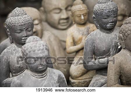 Stock Photograph - Close-Up Of Statues In Shop Near Ubud. Fotosearch