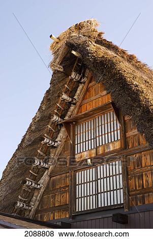Close-Up Of The Thatched Roof Of A Traditional Japanese Village House; Shirakawa, Gifu, Japan View Large Photo Image Stock Photo - Close-Up Of The Thatched Roof Of A Traditional Japanese Village House; Shirakawa, Gifu, Japan. Fotosearch