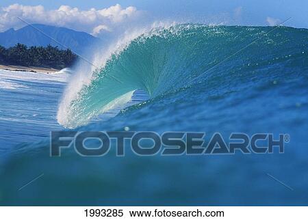 Close-Up Of The Top Of A Big Turquoise, Wave With Slight View Of Beach View Large Photo Image Stock Photography - Close-Up Of The Top Of A Big Turquoise, Wave With Slight View Of Beach. Fotosearch