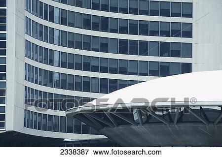 Stock Photo - Close Up Of Toronto City Hall With Domed Round Roof And Curved Tower; Toronto, Ontario, Canada. Fotosearch