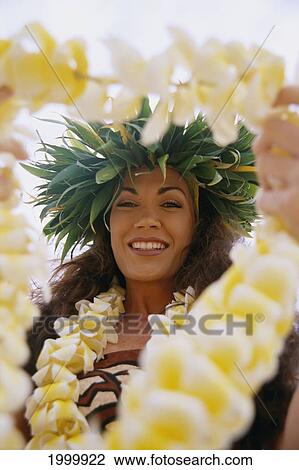Close-Up Of Woman Holding Plumeria Lei Out In Front, About To Pass To C1489 Someone View Large Photo Image Stock Image - Close-Up Of Woman Holding Plumeria Lei Out In Front, About To Pass To C1489 Someone. Fotosearch