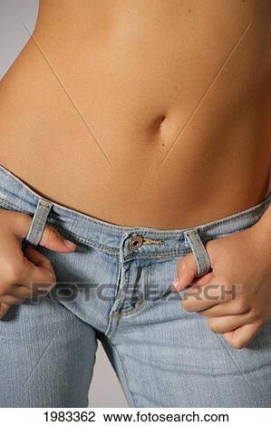 Close-Up Of Womans Tanned And Toned Midsection. View Large Photo Image Stock Image - Close-Up Of Womans Tanned And Toned Midsection.. Fotosearch