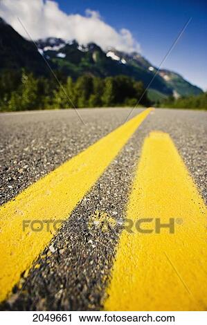 Close Up Of Yellow Stripes On Highway 37A And Mountain Landscape, Northern British Columbia View Large Photo Image Stock Image - Close Up Of Yellow Stripes On Highway 37A And Mountain Landscape, Northern British Columbia. Fotosearch