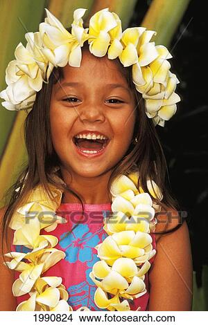 Picture - Close-Up Of Young Local Girl With Plumeria Leis, Greenery Background. Fotosearch