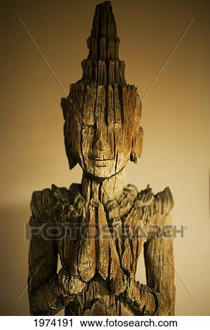 Close-Up On A Wooden Buddha Sculpture (Sepia Photograph). View Large Photo Image Stock Image - Close-Up On A Wooden Buddha Sculpture (Sepia Photograph).. Fotosearch