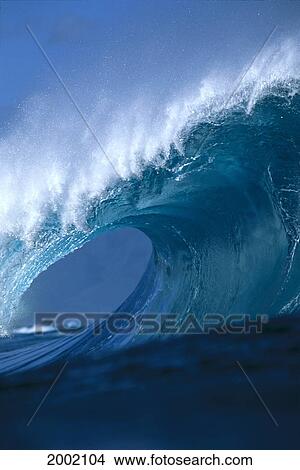 Close-Up Side Angled View Of Large Wave Curl, Background Visible Through Opening View Large Photo Image Picture - Close-Up Side Angled View Of Large Wave Curl, Background Visible Through Opening. Fotosearch